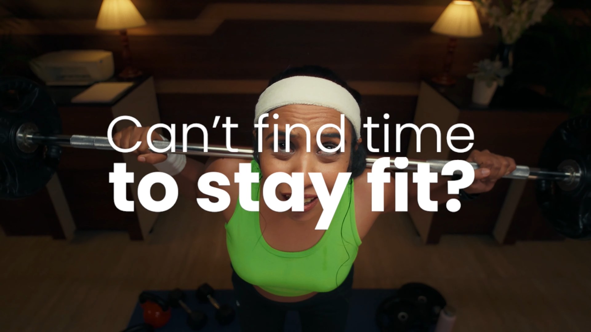 FITREATcouple campaign still, woman lifting a barbell