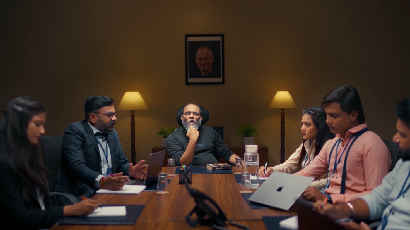 Film still, conference room scene