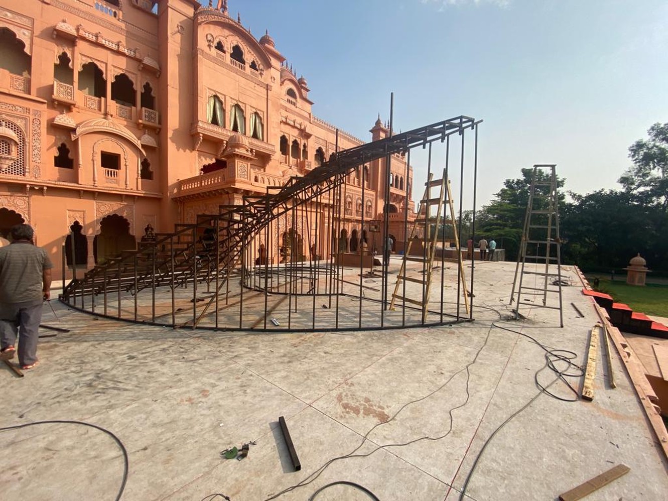 Structure under construction against the fort by day