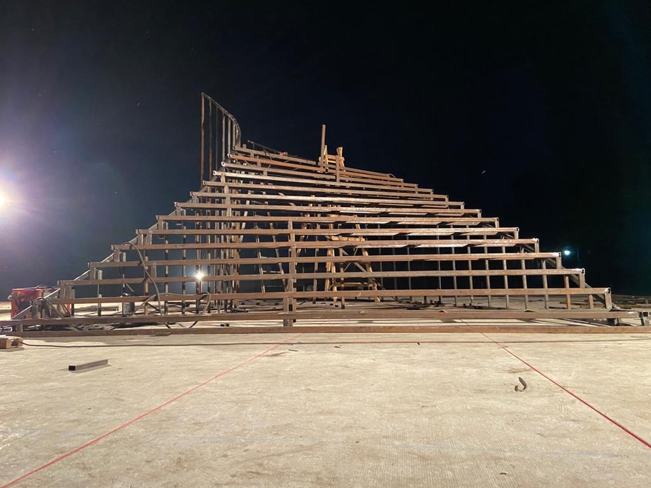 Structure under construction at night